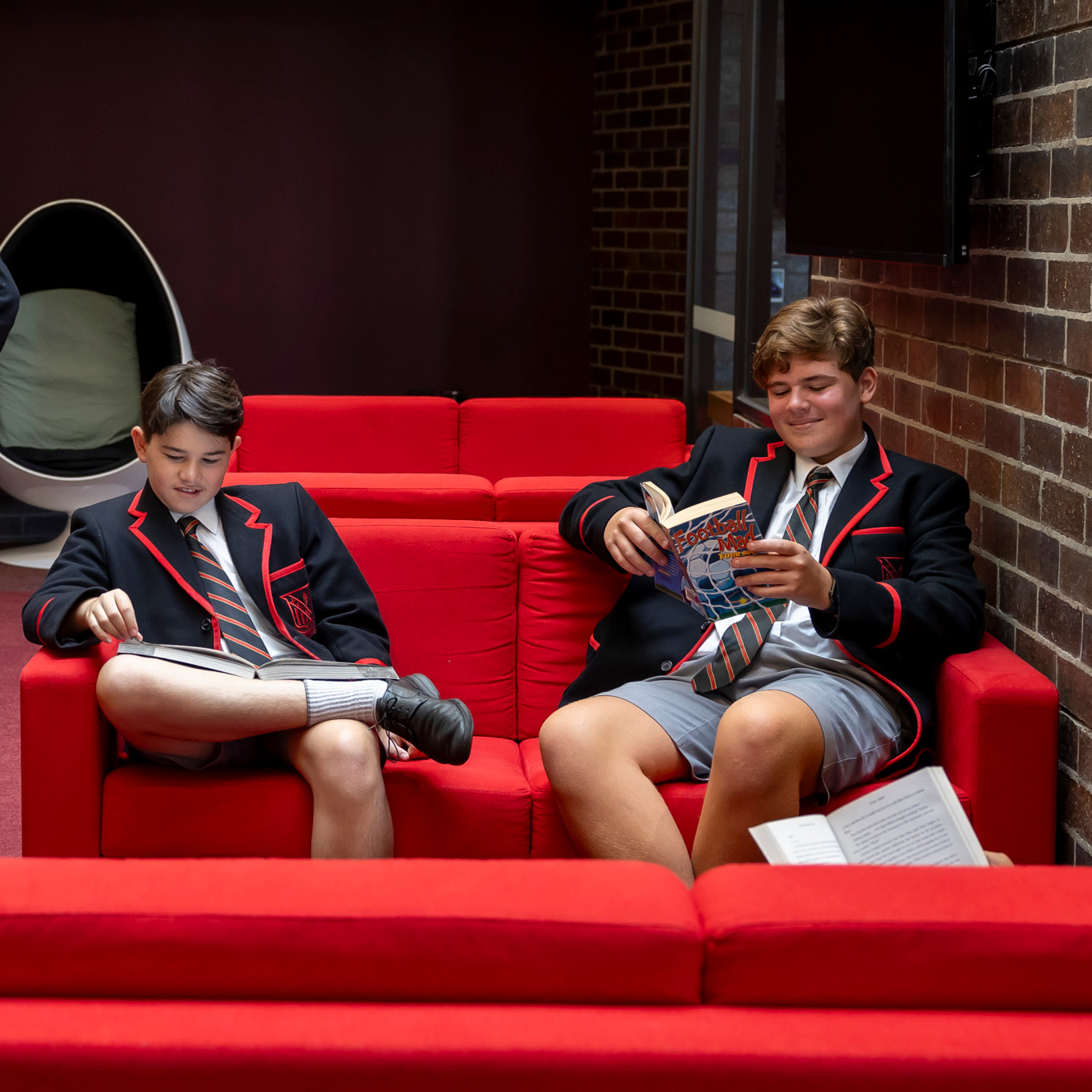 Xavier College student reading
